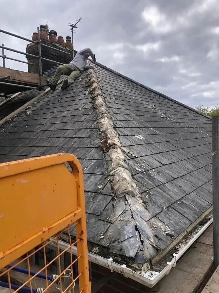 Slate roof ridge and chimney repair in St Stephen in Brannel